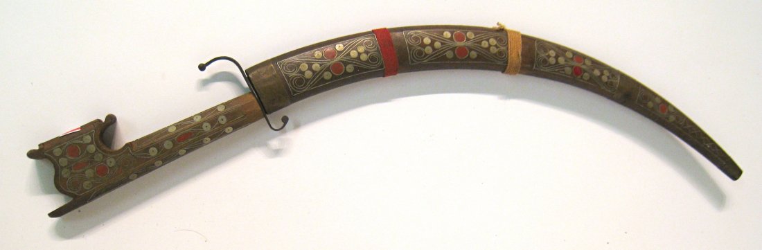 Display Sword And Sharpening Tool: The curved blade sword , 24" in length with a leather hand held blade sharpener (sharpener not pictured). Shipping: We are unable to ship this item. Please contact our local UPS Store, store1152@theup