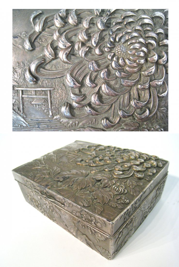 Chinese Metal Box: Nicely done: a bas relief in repousse with a metal box and a pattern of a chrysanthemum on the lid. About 5 1/2" X 4 1/2" X 2". Shipping: We are able to pack and ship this item to an address in the Un