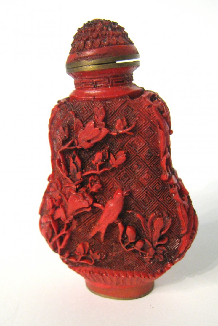 Chinese Cinnabar Snuff Bottle: Shipping: We are able to pack and ship this item to an address in the United States for $15.00 via USPS Priority Mail. Tracking information will be sent to your email address. Each additional item of 