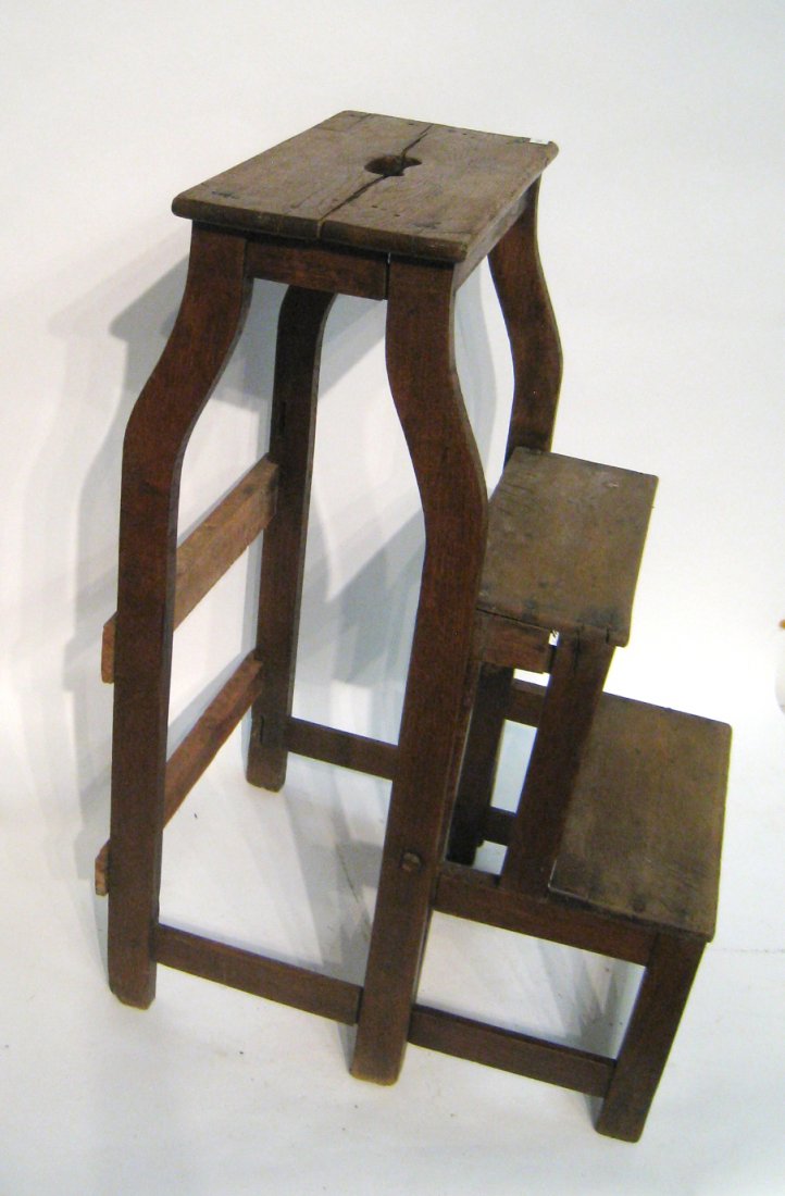 Ladder: A standing ladder/stool wherein the steps retract into the base. Early 20th century. 31" Shipping: We are unable to ship this item. Please contact our local UPS Store, store1152@theupsstore.com, or th