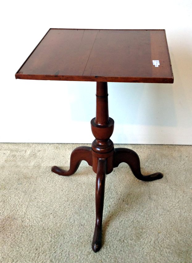 Square Top Candlestand: A solid cherry three legged candlestand. American, 19th century. 25 1/2" tall. Shipping: We are unable to ship this item. Please contact our local UPS Store, store1152@theupsstore.com, or the Packagin