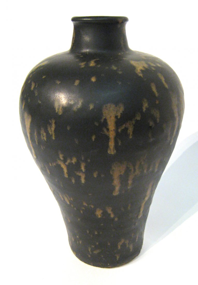 Black Glaze Meiping: Song dynasty Jian ware black and spatter glaze 9 1/2" Mei vase. Shipping: We are able to pack and ship this item to an address in the United States for $40.00 via USPS Priority Mail or via FedEx Groun