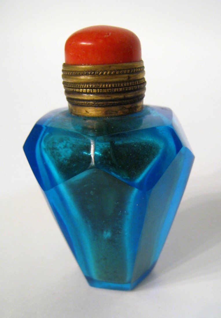 Blue Cut Chinese Glass Snuff: Blue Peking glass snuff bottle. 3" Shipping: We are able to pack and ship this item to an address in the United States for $25.00 via USPS Priority Mail. Tracking information will be sent to your emai