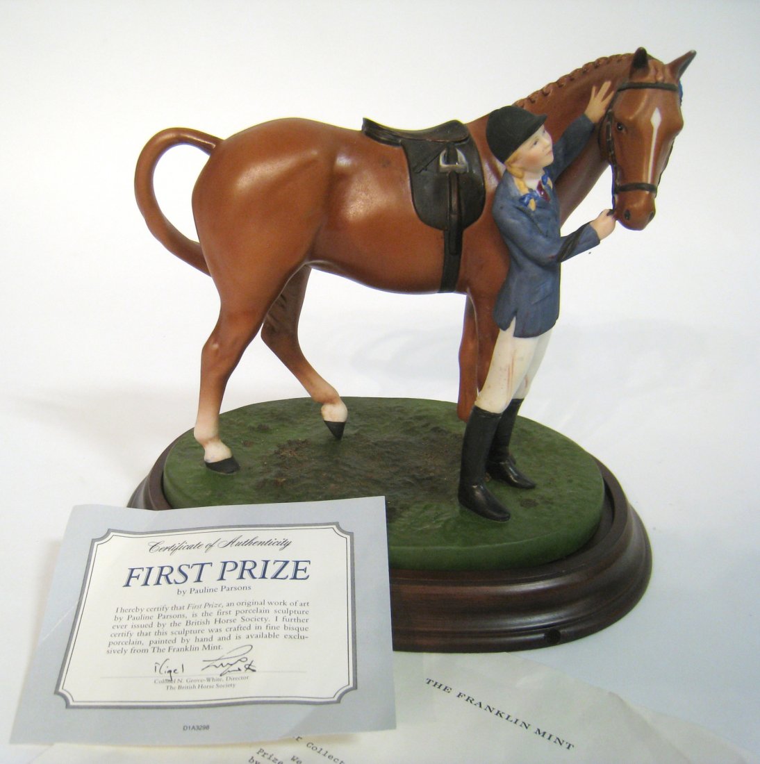 Painted Bisque Ware Figurine: Of a horse, signed as "British Horse Society" and copy write by the Franklin Mint, with base, 9" X 8 1/2". Shipping: We are able to pack and ship this item to an address in the United States for $50.0