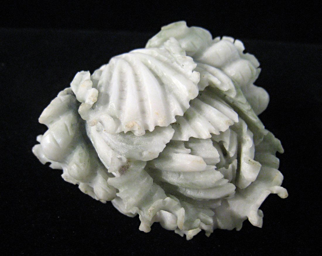 Carved Jade Cabbage: Depiction of a cabbage plant, with white- green jade, Chinese, about 4" in height. Nicely done. Shipping: We are able to pack and ship this item to an address in the United States for $25.00 via USPS