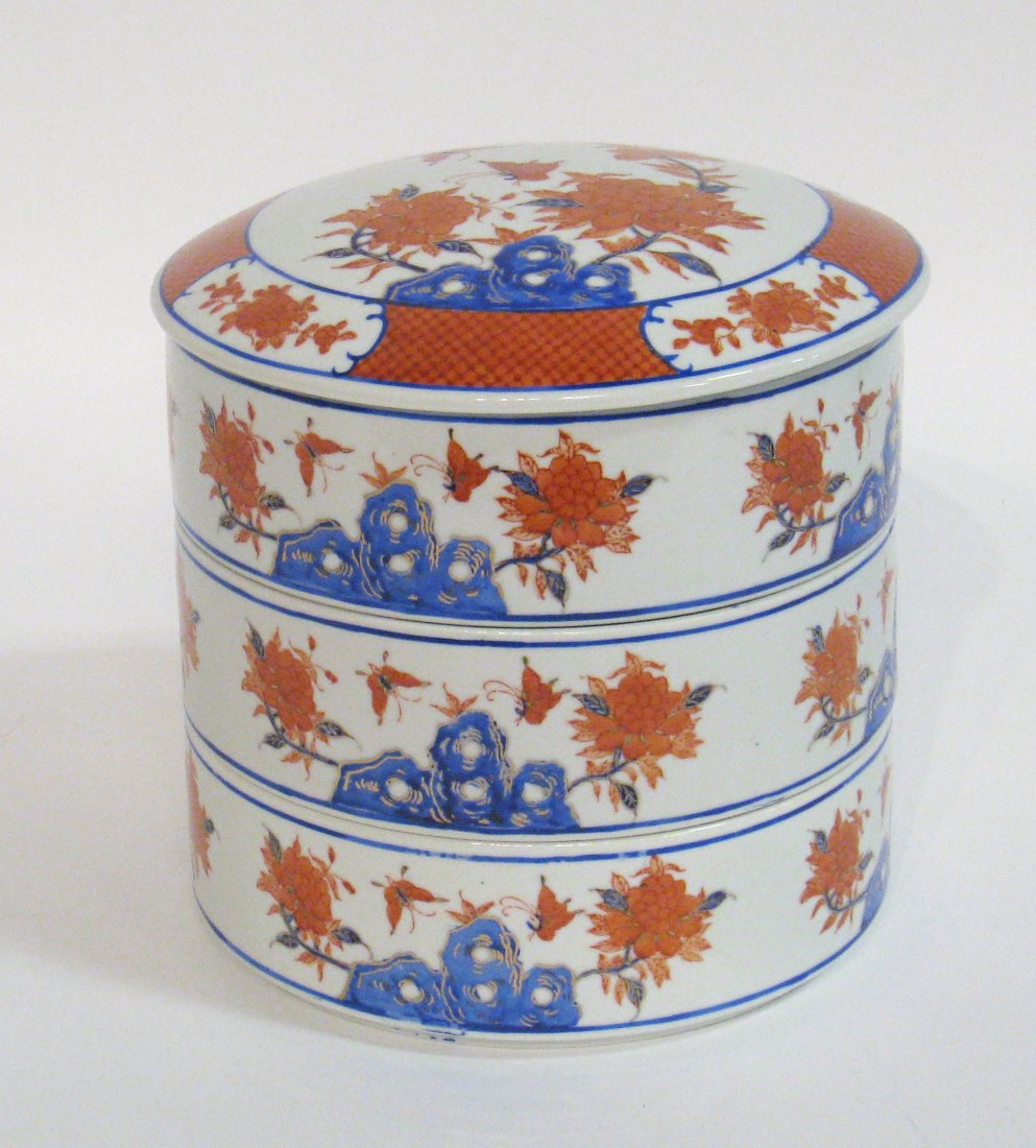 Stacking Imari Style Item: About 8" tall, with three separate containers, stacked. Shipping: We are able to pack and ship this item to an address in the United States for $50.00 via USPS Priority Mail or via FedEx Ground/Home D