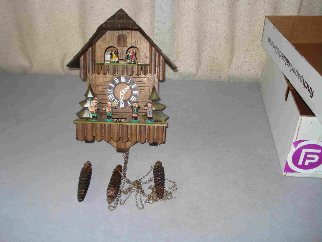 Three Weight Cuckoo Clock: This chalet cuckoo with three weights has an automaton music box that plays every hour in addition to the function of the cuckoo bird. Shipping: We are able to pack and ship this item to an address in