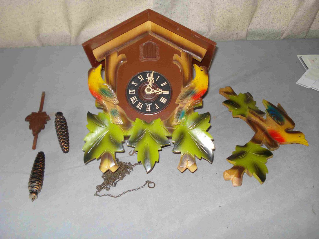 Wall Cuckoo Clock: Complete with two weights, pendulum and crest. Shipping: We are able to pack and ship this item to an address in the United States for $50.00 via USPS Priority Mail or via FedEx Ground/Home Delivery.