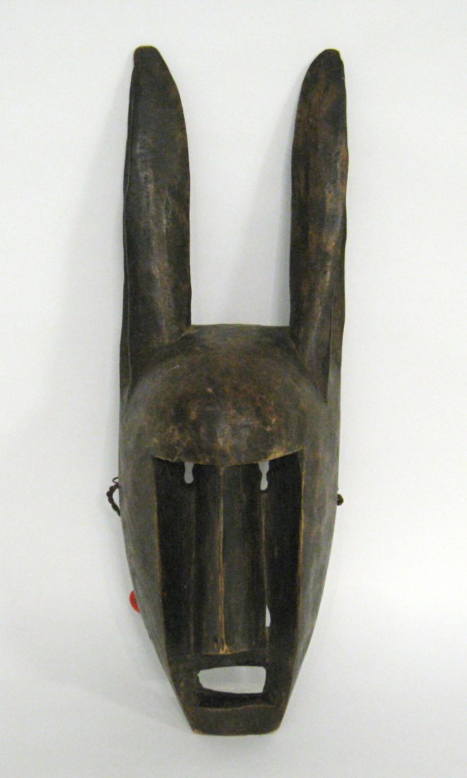 African Bamana Mask: A Bamana courage mask from Mali, carved in wood., 23" in height Shipping: We are unable to ship this item. Please contact our local UPS Store, store1152@theupsstore.com, or the Packaging Store, hello@