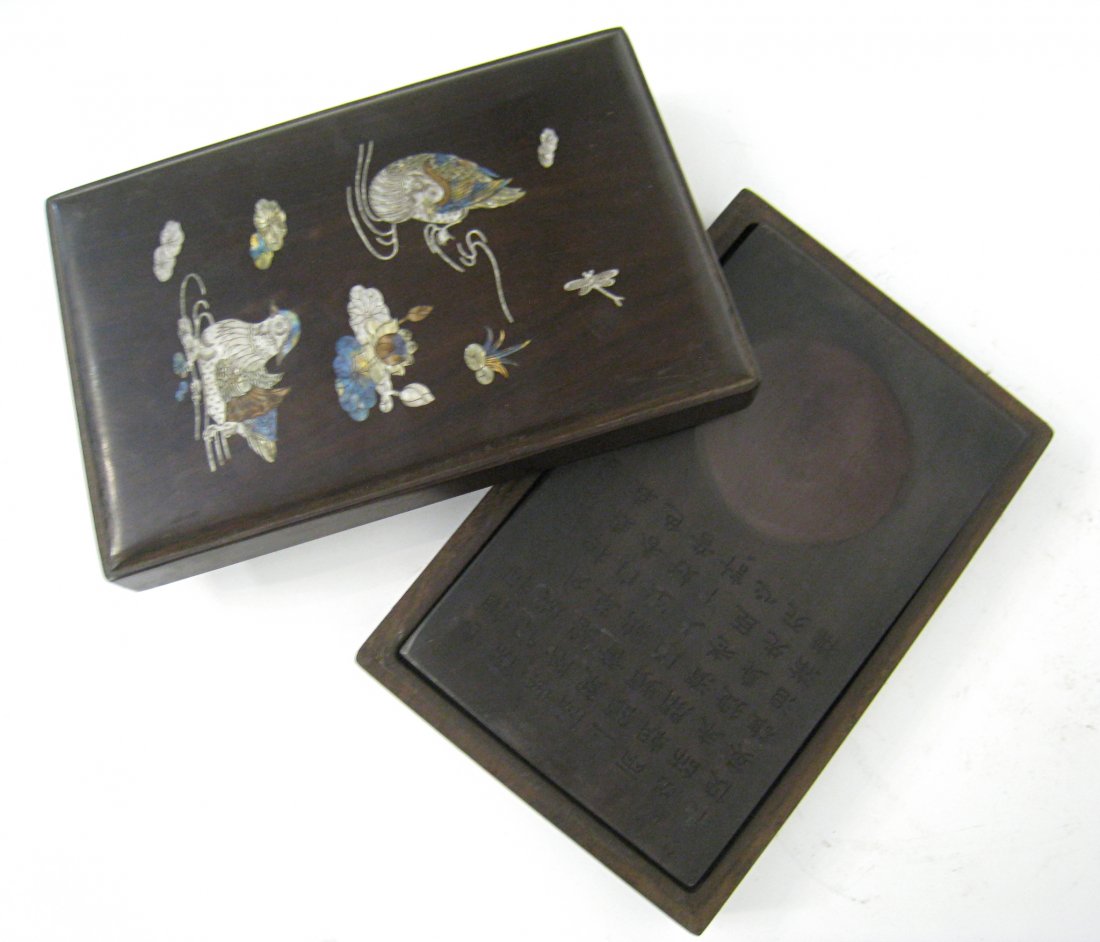 Duan Inkstone And Case: A Chinese inkstone encased within a nacre inlay box, 2 1/4" X 10 1/2" X 6 1/2". Shipping: We are able to pack and ship this item to an address in the United States for $40.00 via USPS Priority Mail or