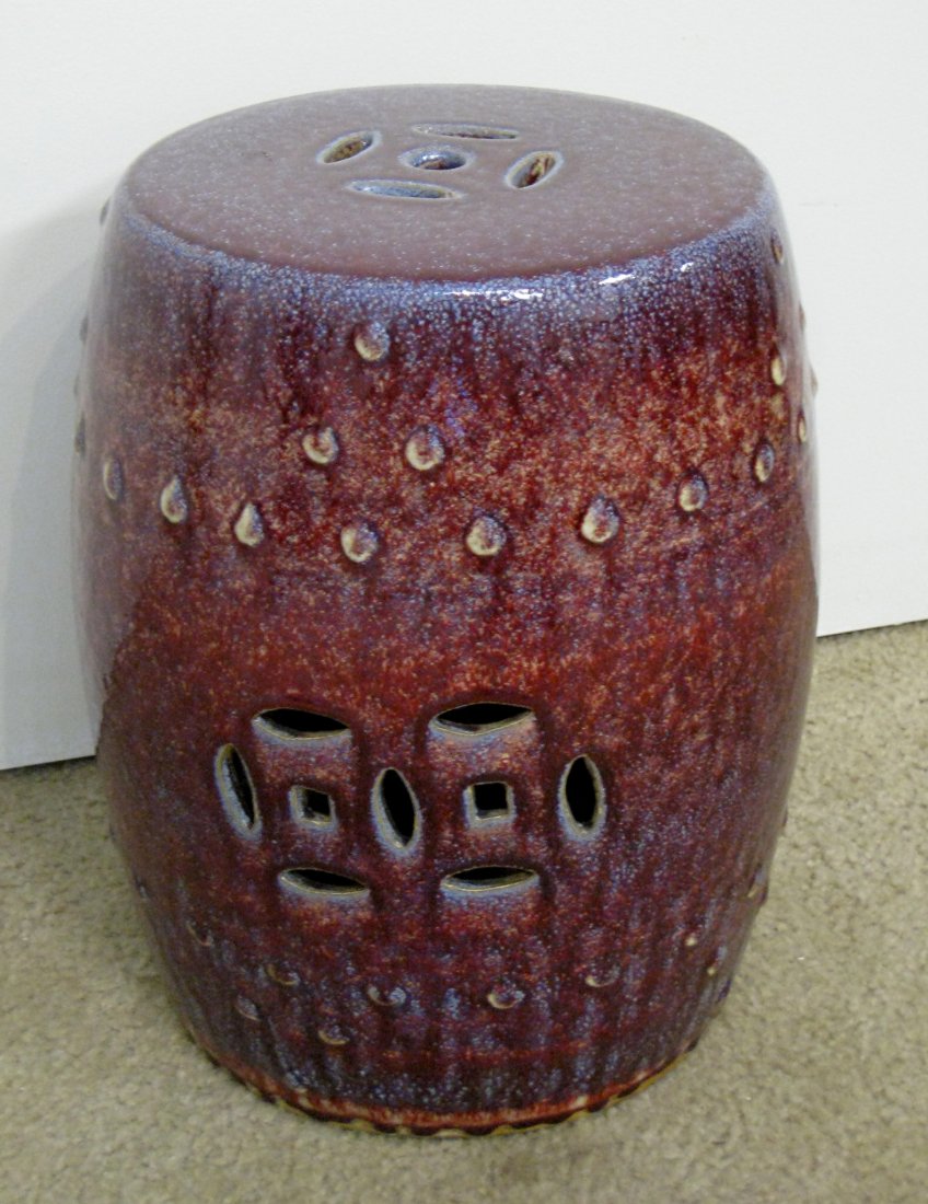 Chinese Flambe Glaze Garden Stool: About 16", the Flambe ordinarily uses three distinctly different glazes, one for the blue inside, one for the red outside and a third for the brownish green effect created when applied to the foot-rim