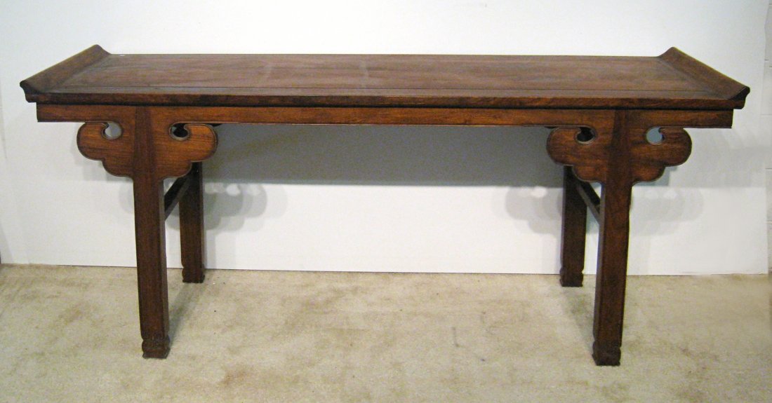 Huanghuali Altar Table: Huanghuali Altar Table of the early Qing dynasty. The top supported by pierce carved brackets. This came to us through the consignor as very dirty and well-used, although apparently original. We have 
