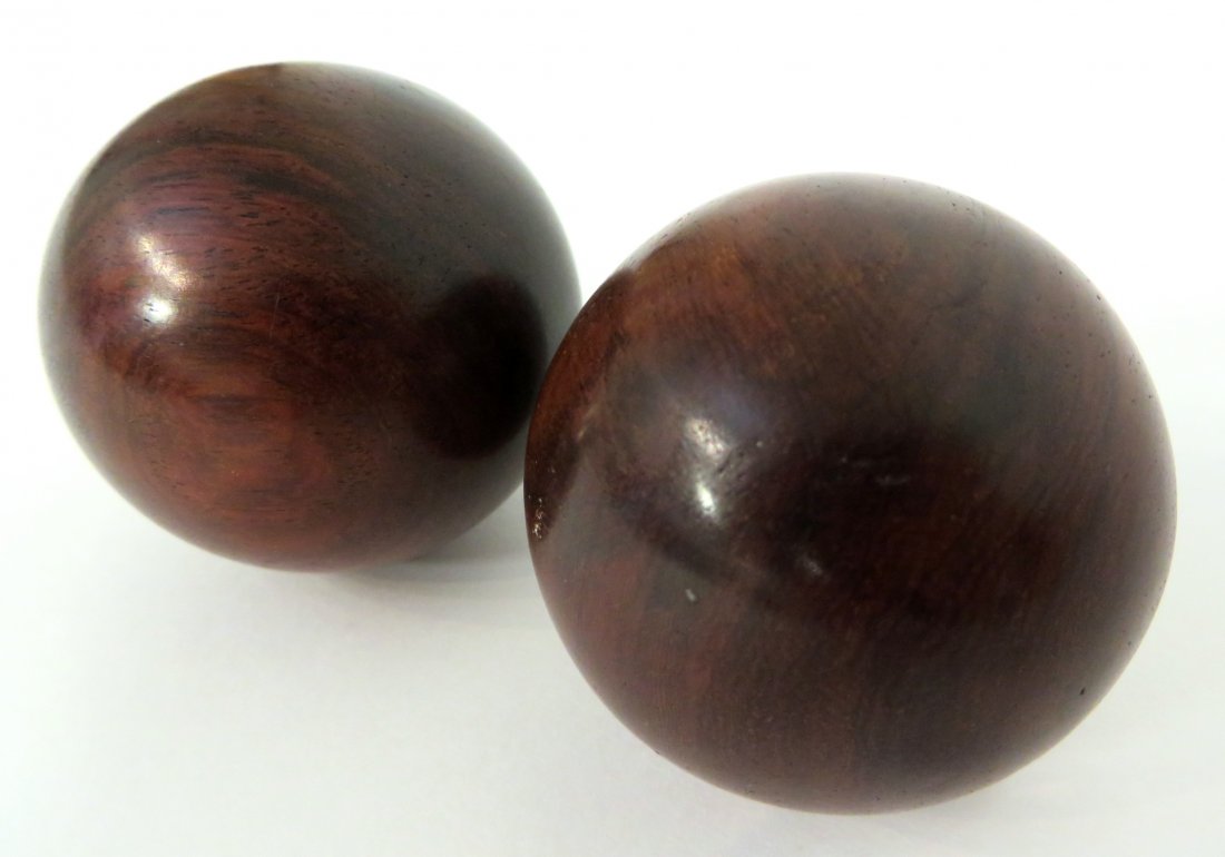 Pair Chinese Huanghuali Balls: 127 grams. About 2" diameter Shipping: We are able to pack and ship this item to an address in the United States for $25.00 via USPS Priority Mail. Tracking information will be sent to your email addr