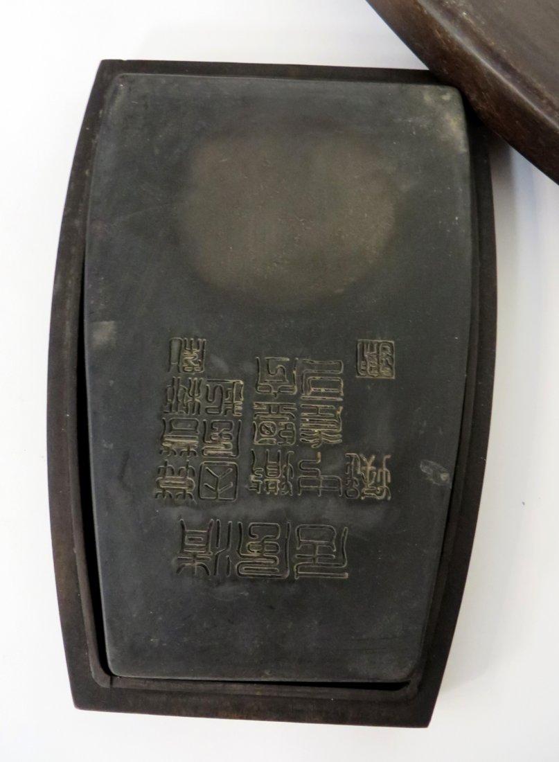 Chinese Duan Inkstone In Case: 10 1/4" X 7" Shipping: We are able to pack and ship this item to an address in the United States for $50.00 via USPS Priority Mail or via FedEx Ground/Home Delivery. Tracking information will be sent 