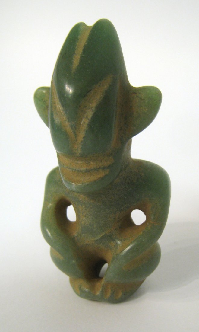 Chinese Green Jade Alien: 2 3/4" Shipping: We are able to pack and ship this item to an address in the United States for $25.00 via USPS Priority Mail. Tracking information will be sent to your email address. Each additional i