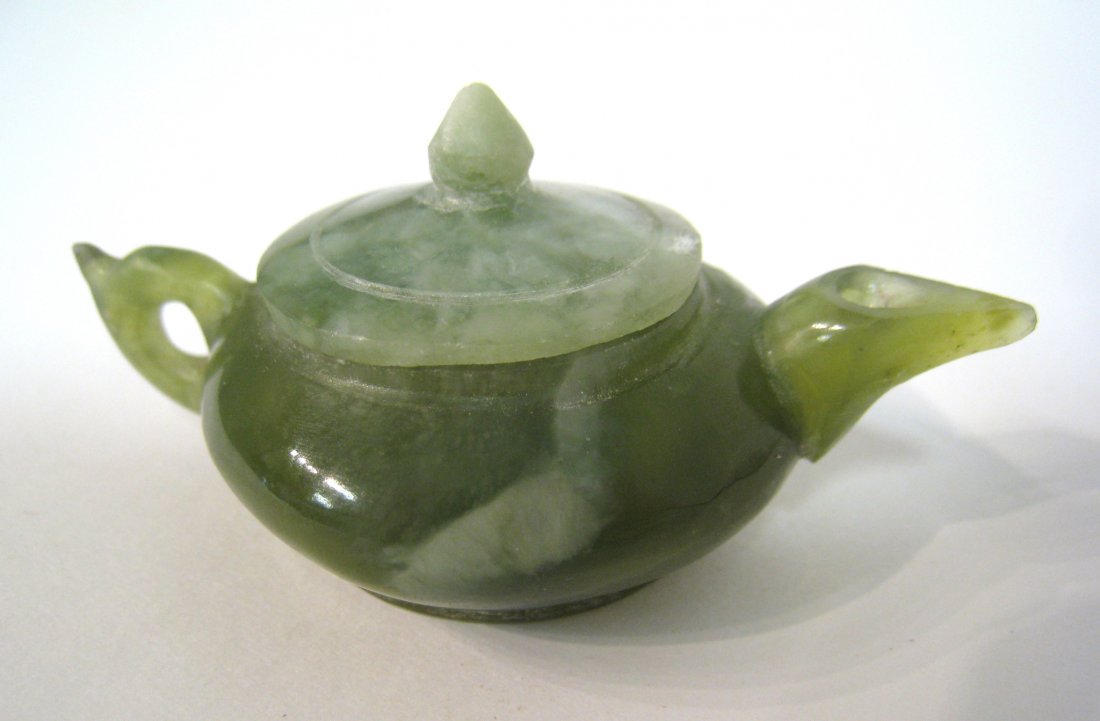 Chinese Jade Soy Sauce Pitcher: 3 1/8" Shipping: We are able to pack and ship this item to an address in the United States for $25.00 via USPS Priority Mail. Tracking information will be sent to your email address. Each additional i