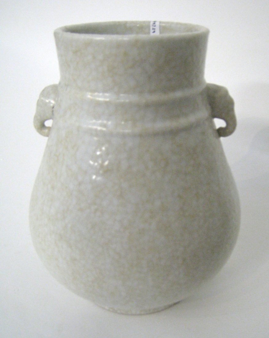 Chinese Celadon: In egg white celadon glaze with crackleature, 10". Shipping: We are able to pack and ship this item to an address in the United States for $40.00 via USPS Priority Mail or via FedEx Ground/Home Delive