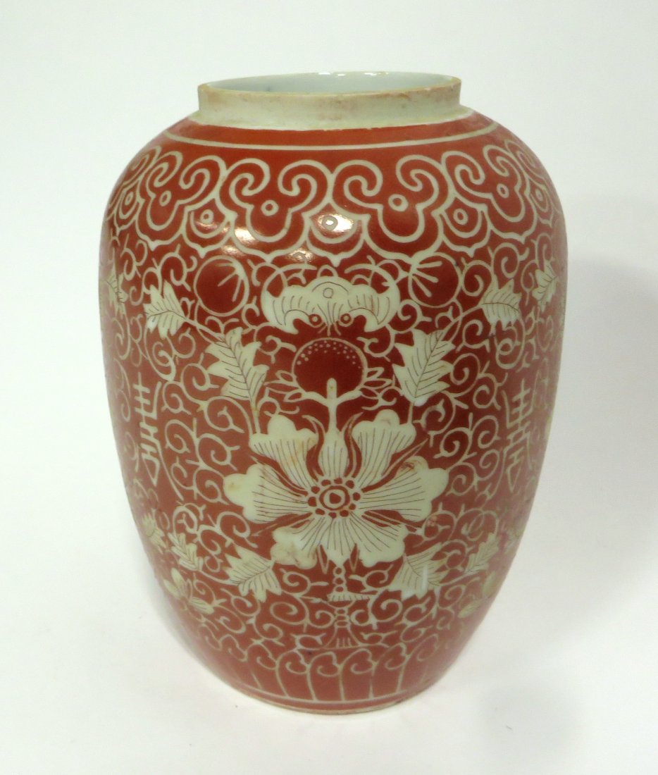 Chinese Red Jar With Flowers And Bats: Marked on bottom. About 7 1/4" Shipping: We are able to pack and ship this item to an address in the United States for $40.00 via USPS Priority Mail or via FedEx Ground/Home Delivery. Tracking informa