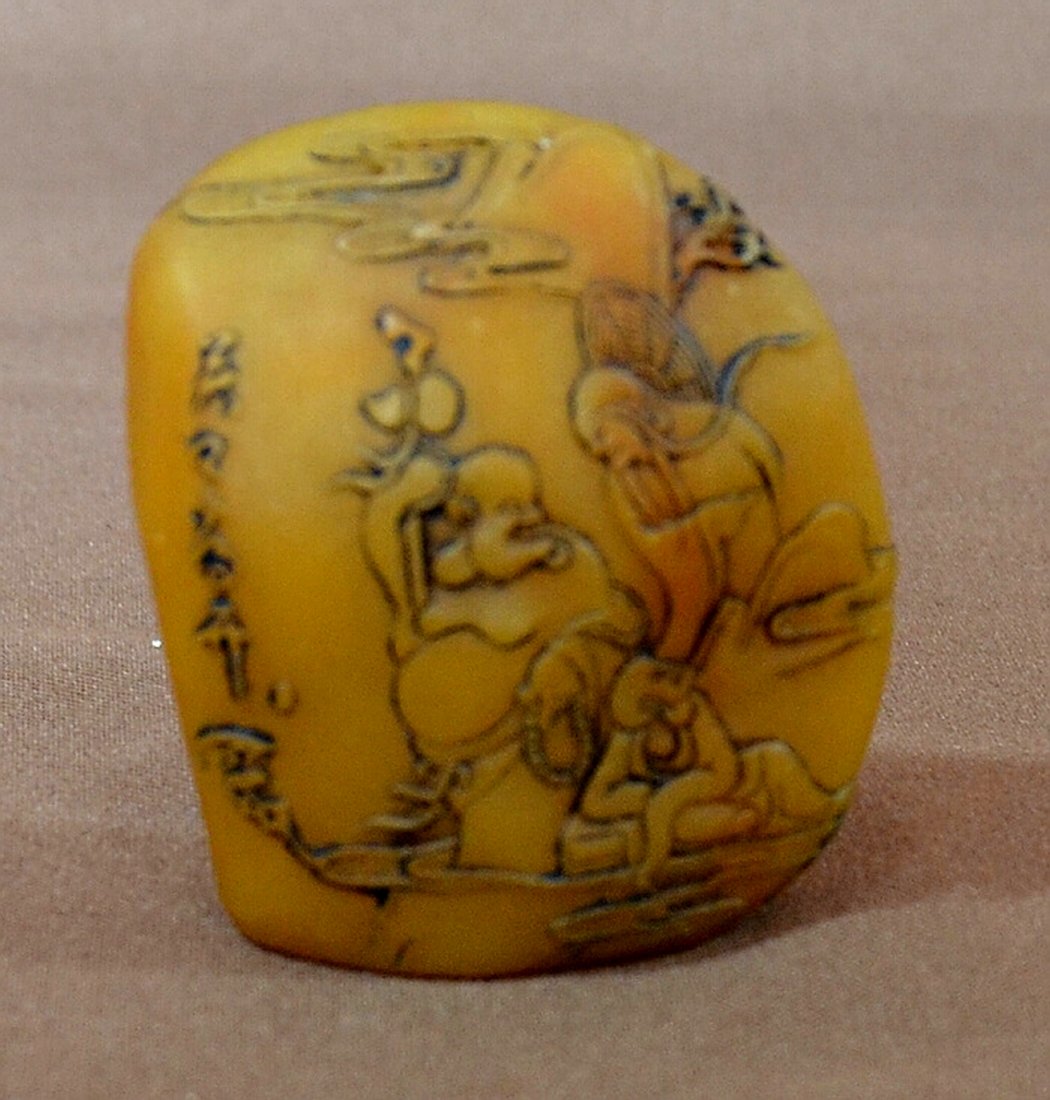 Chinese Tianhuang Stone Seal: With painted on flower design. 98 grams. 2 1/2" Shipping: We are able to pack and ship this item to an address in the United States for $25.00 via USPS Priority Mail. Tracking information will be sent