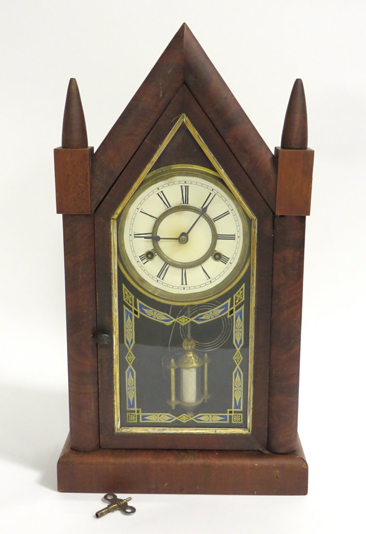 Steeple Clock: American 19th century shelf clock, steeple clock, 21" tall. Shipping: We are unable to ship this item. Please contact our local UPS Store, store1152@theupsstore.com, or the Packaging Store, hello@pack