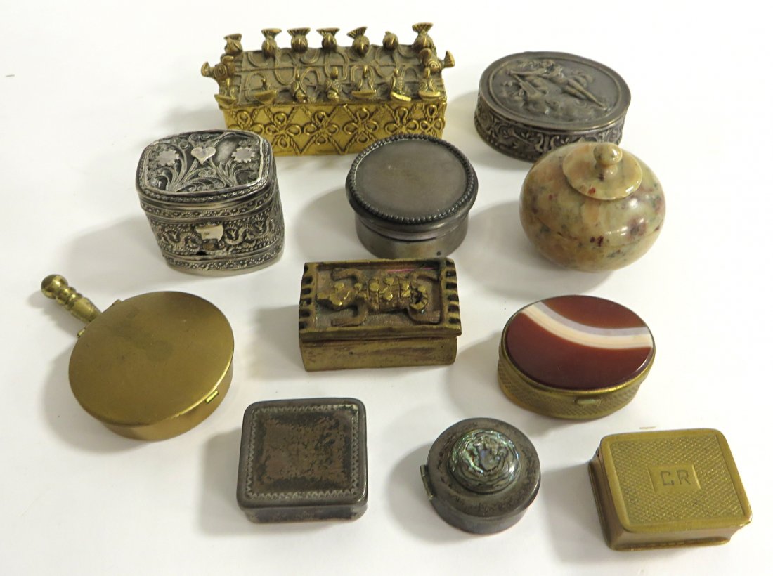 Collection Of Pill Boxes: A total of 11 items in silver tone, brass, stone Shipping: We are able to pack and ship this item to an address in the United States for $30.00 via USPS Priority Mail. Tracking information will be sen