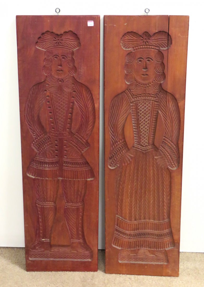 Pair Of Large Butter Molds: For extreme butter fans- a pair of two giant 39" butter molds with reverse carved figures of a man and woman. Shipping: We are unable to ship this item. Please contact our local UPS Store, store1152@t