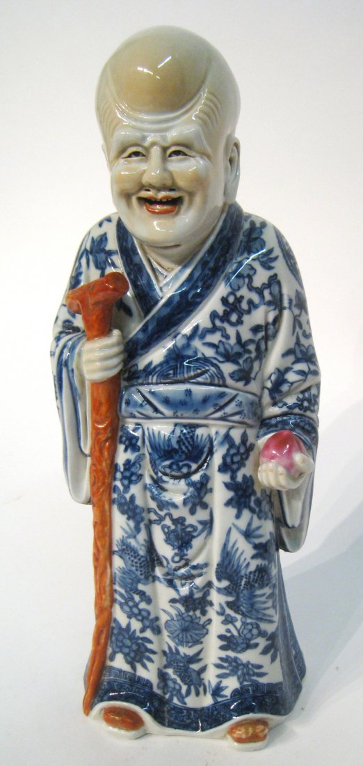 18th/19th C. Chinese Porcelain Statue: With blue and white flower pattern on porcelain body. About 12 1/2" tall. Shipping: We are able to pack and ship this item to an address in the United States for $50.00 via USPS Priority Mail or via F