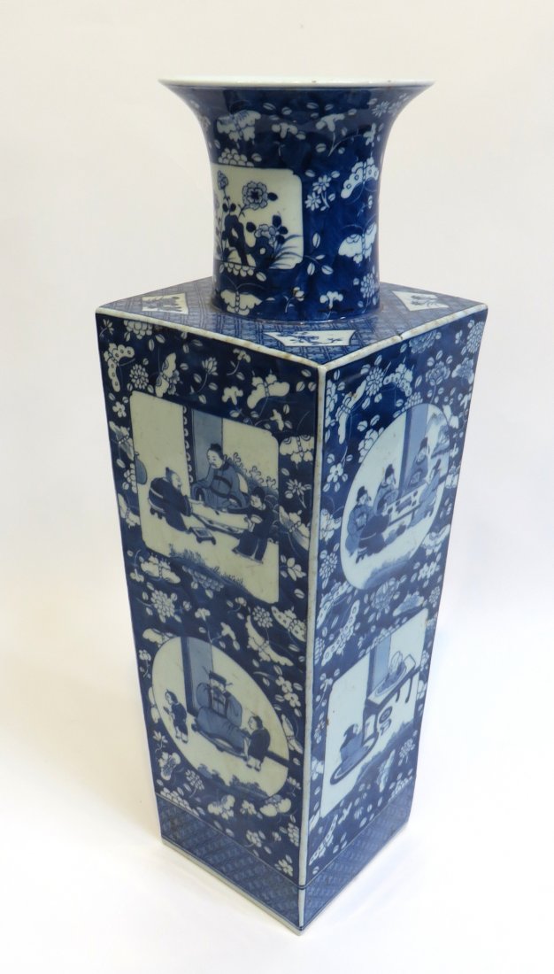 Blue & White Chinese Display Vase: Four sided, and 22" in height with reserves in blue and white depicting everyday Chinese life. Shipping: We are unable to ship this item. Please contact our local UPS Store, store1152@theupsstore.com,