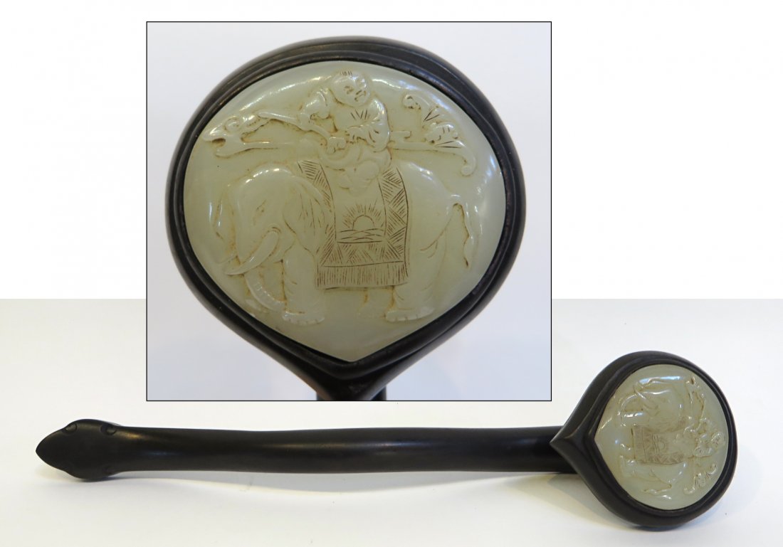 Mounted Jade & Zitan Ruyi: A 14" with a white jade carved elephant with a houda and rider in a rosewood handle. Shipping: We are able to pack and ship this item to an address in the United States for $40.00 via USPS Priority Ma