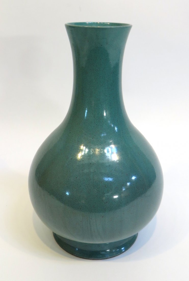 Robin Egg Glazed Vase: With a light turquoise green. 12" tall. Shipping: We are able to pack and ship this item to an address in the United States for $50.00 via USPS Priority Mail or via FedEx Ground/Home Delivery. Trackin