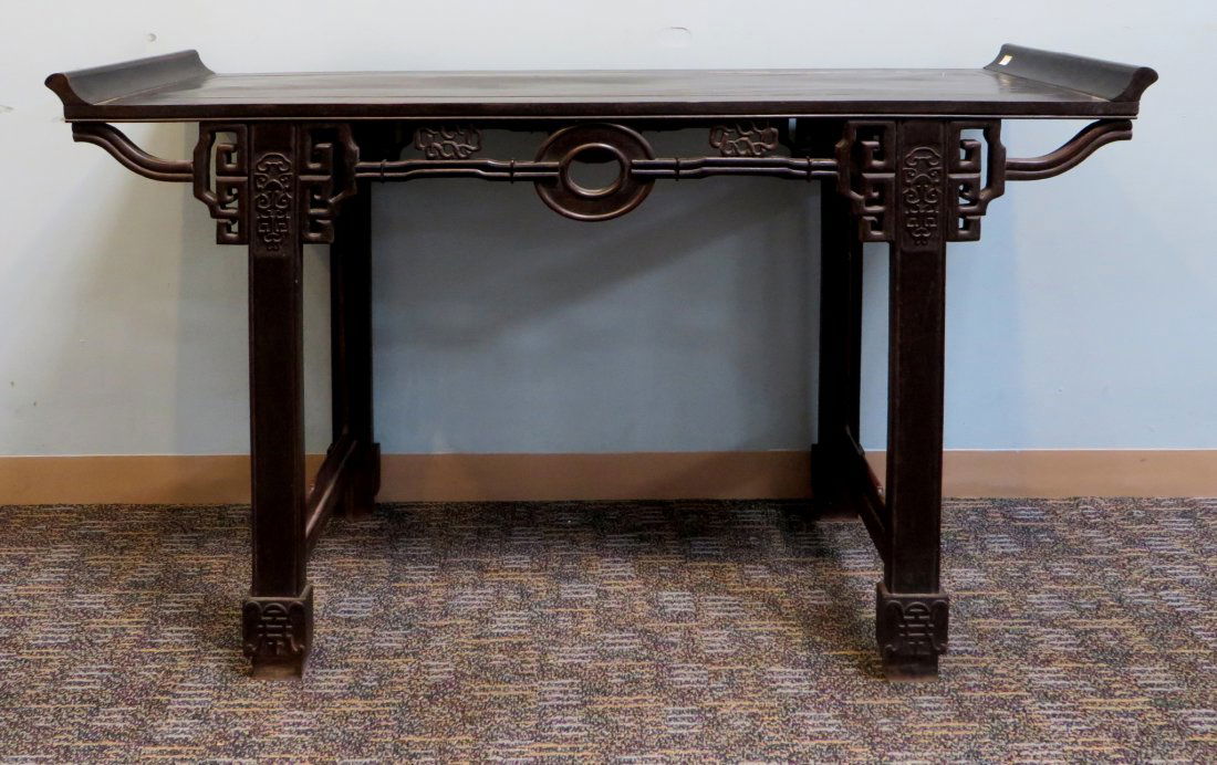 Zitan Alter Table: Dark dense Zitan wood table with turned up top ends, and square legs. Missing skirt carving elements. 33 1/2" X 49" X 16 1/2". Shipping: We are unable to ship this item. Please contact our local UPS S