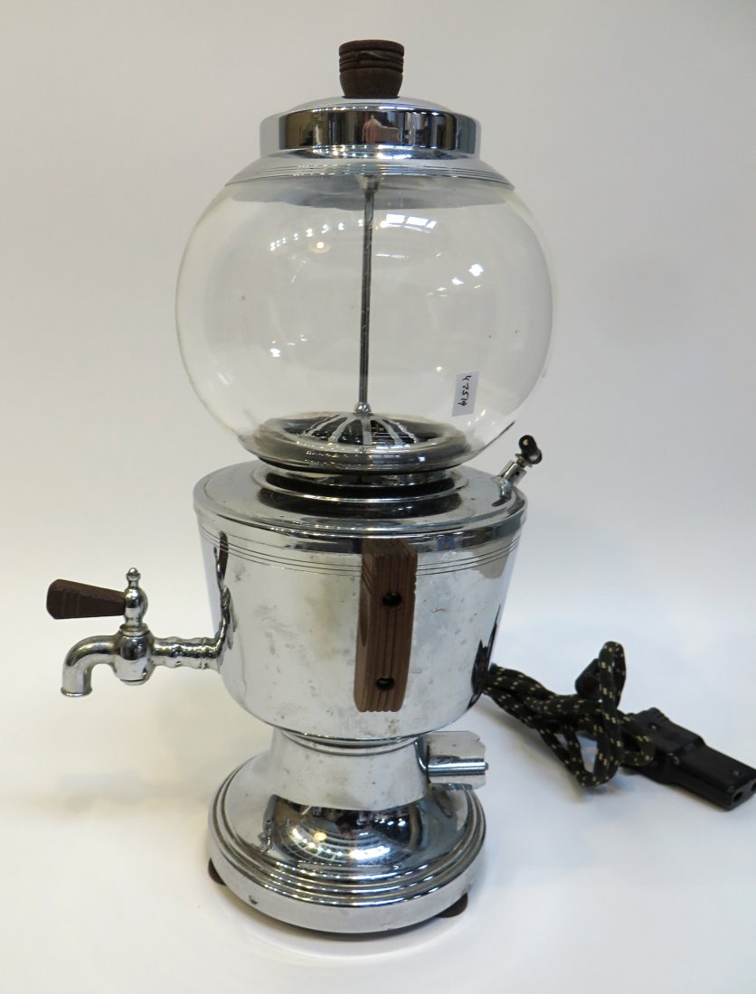 Chrome And Glass Coffee Maker: A vintage coffee maker, fresh coffee percolates into the dome above. 14" tall. Shipping: We are able to pack and ship this item to an address in the United States for $50.00 via USPS Priority Mail or