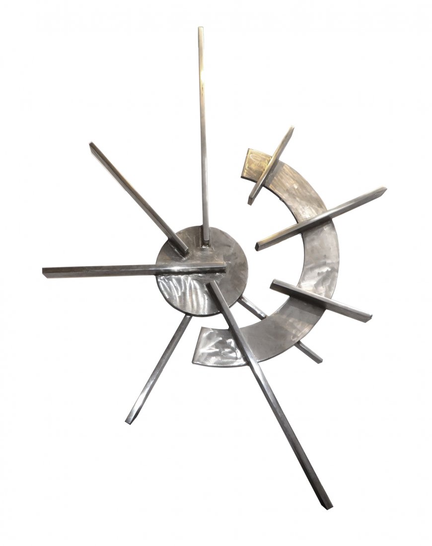 Wall Hanging By Carlus Dyer: A solid brushed metal wall hanging stamped on the back with the artist's name, Carlus Dyer (American) dated 1982. Comes with bracket to attach to the wall. 57" X 37" Shipping: We are unable to ship th