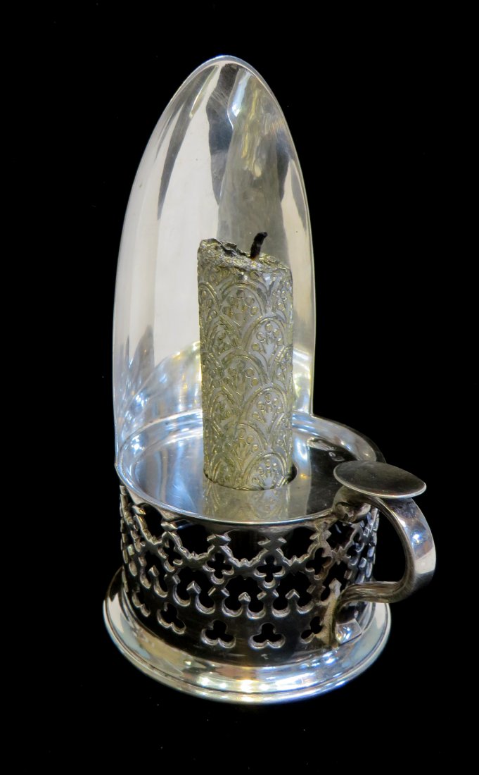 Silver Night Candle Stand: No markings found, a single candle stand 5 1/2". Shipping: We are able to pack and ship this item to an address in the United States for $25.00 via USPS Priority Mail. Tracking information will be sen