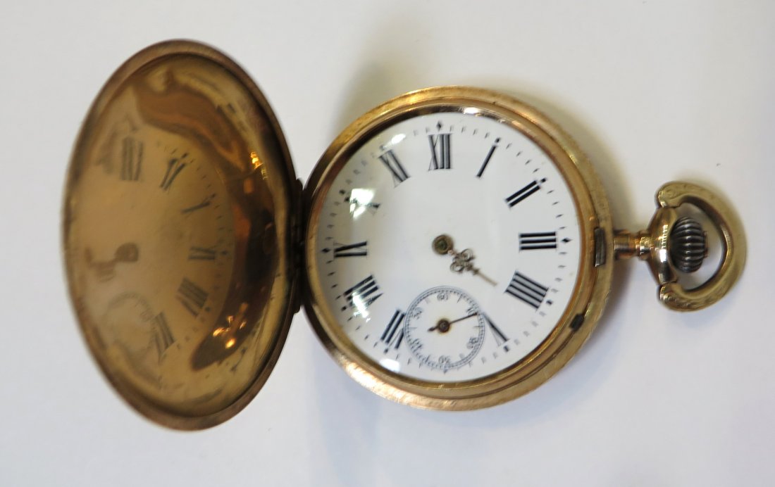 Swiss Hunting Cased Watch: A low karat gold or gold filled hunting cased pocket watch (not tested) enclosing a 16size Swiss made watch with a seventeen jewel bar lever movement that is stem wind and lever set. Missing both the 