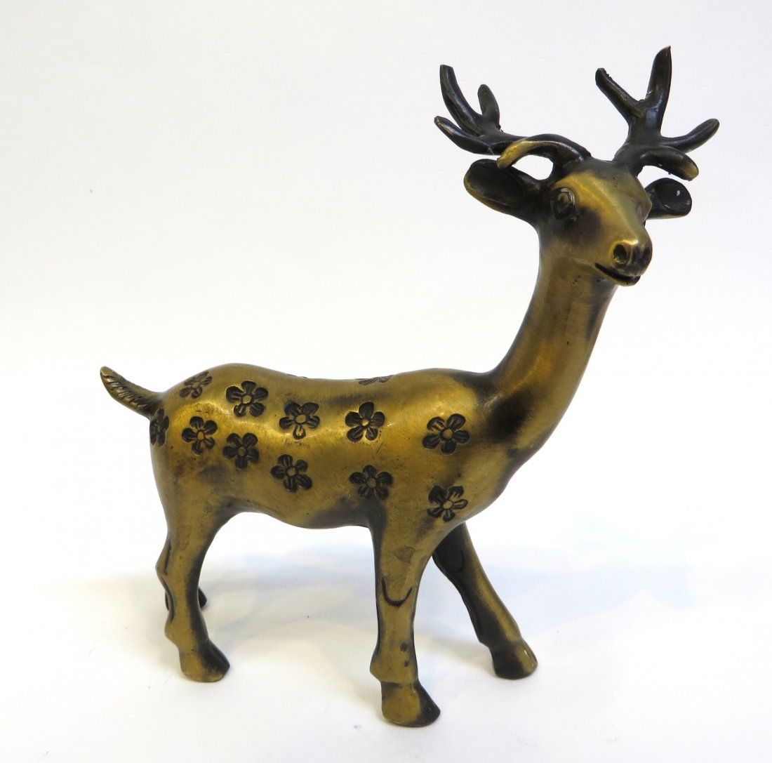 Deer Sculpture: In painted bronze, 7 1/2" tall. Shipping: We are able to pack and ship this item to an address in the United States for $30.00 via USPS Priority Mail. Tracking information will be sent to your email a
