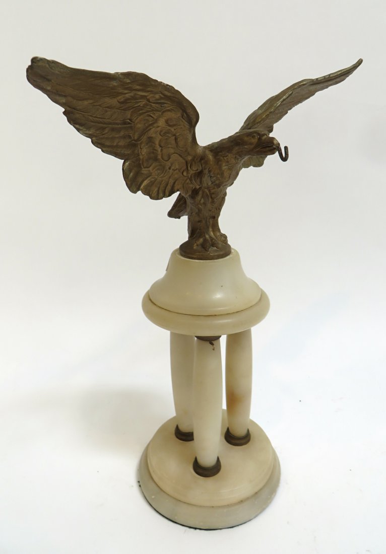 Eagle Form Watch Holder: Display your collectable pocket watch from this 19th century display "Watch holder". 11" tall. Eagle's wingspan is 8 1/2". Shipping: We are able to pack and ship this item to an address in the United 