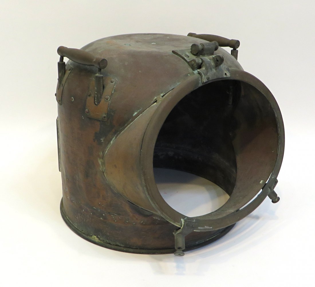 Brass Ships Binnacle: Solid brass, but needing polish for sure, and with windows on each side to view ship's instruments, about 14" high, 13" across. Shipping: We are able to pack and ship this item to an address in the Un