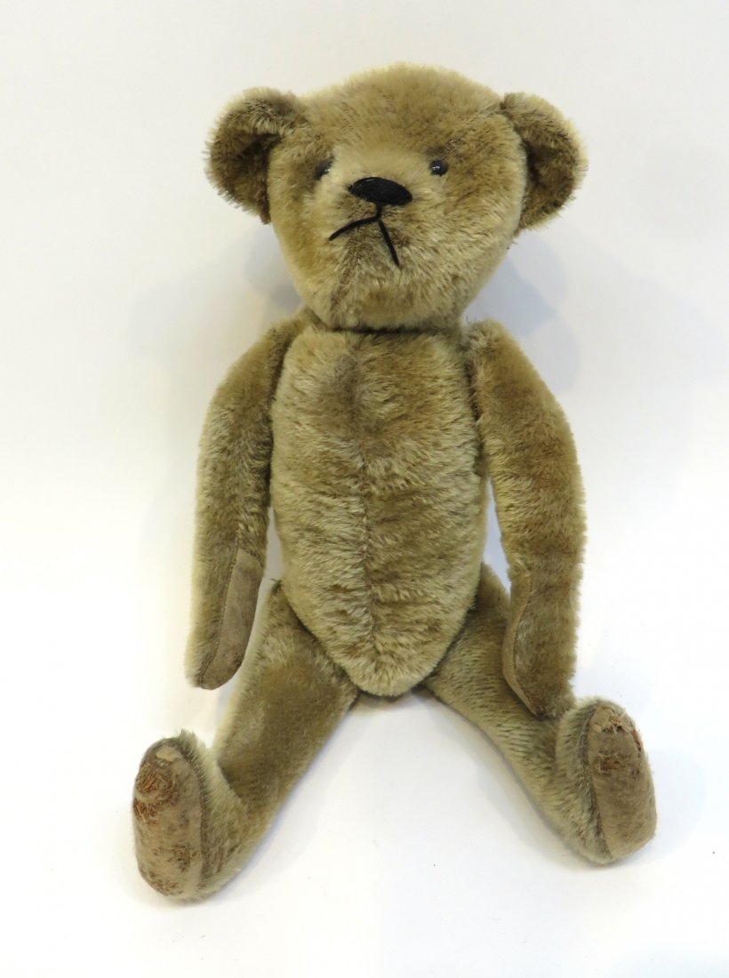 Teddy Bear By Ideal Co.: Ideal Teddy Bear probably 1920s. 17" Long. Shipping: We are able to pack and ship this item to an address in the United States for $50.00 via USPS Priority Mail or via FedEx Ground/Home Delivery. Trac