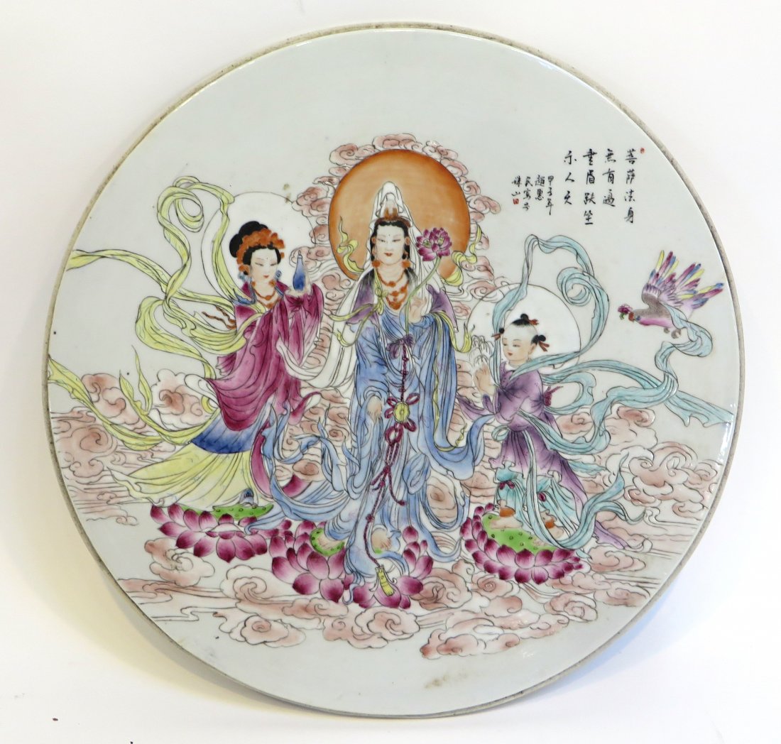 Round Famille Rose Plaque: 13" across, featuring exceptional wucai glae art work. Shipping: We are able to pack and ship this item to an address in the United States for $50.00 via USPS Priority Mail or via FedEx Ground/Home De