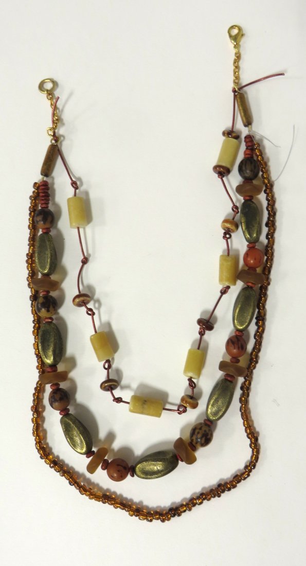 Jane Ruddell Design Jewelry: Made from various beaded and found devices. Shipping: We are able to pack and ship this item to an address in the United States for $25.00 via USPS Priority Mail. Tracking information will be sent to 