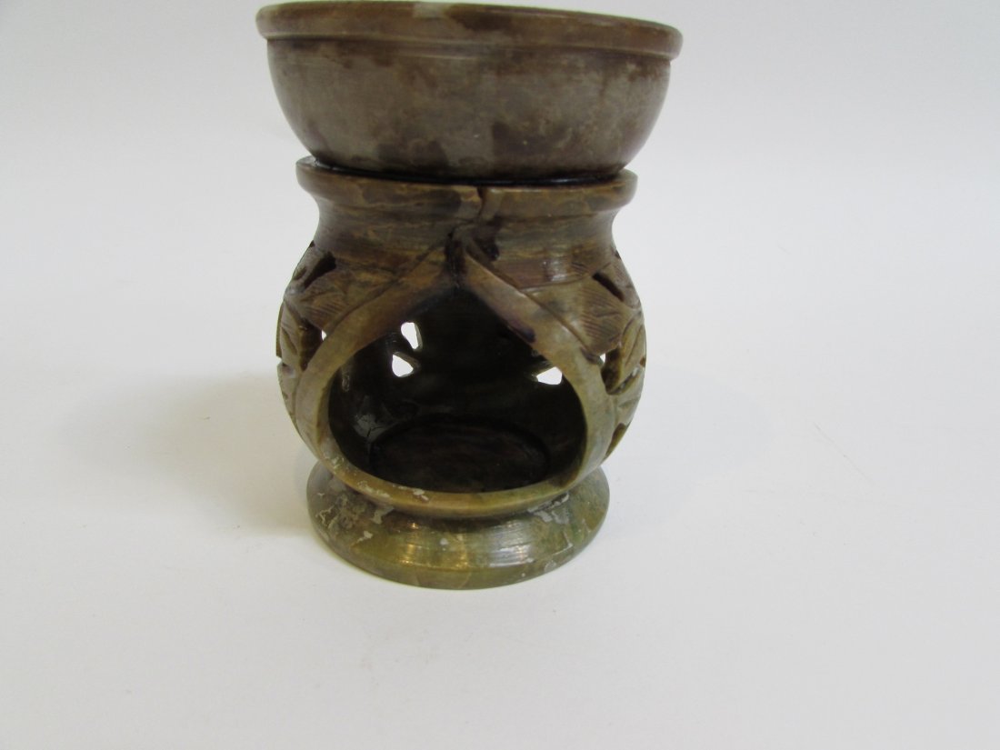 Soapstone Candle Holder: 4 1/8" in height Note damage to upper rim. Shipping: We are able to pack and ship this item to an address in the United States for $25.00 via USPS Priority Mail. Tracking information will be sent to y