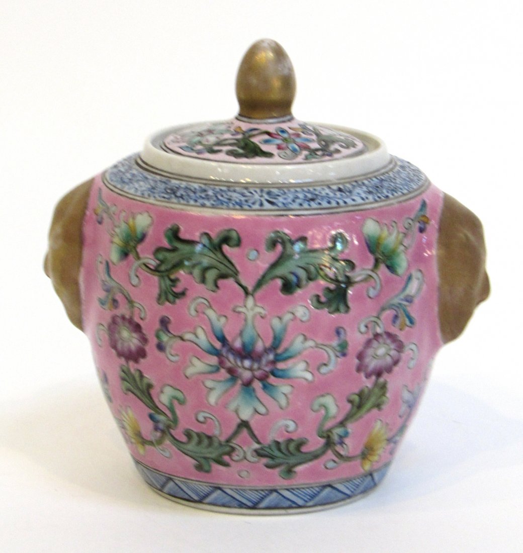 Chinese Porcelain Container: A 4" lidded container in a scrolling design. Shipping: We are able to pack and ship this item to an address in the United States for $30.00 via USPS Priority Mail. Tracking information will be sent to