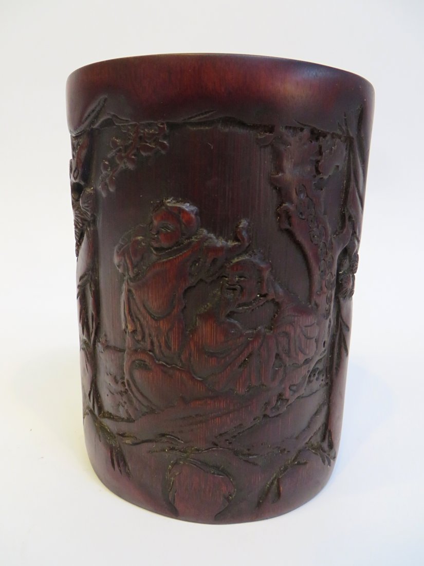Bamboo Brush Pot: 6 3/4" tall X 5" brush pot carved with calligraphy and a figures in a landscape. Shipping: We are able to pack and ship this item to an address in the United States for $30.00 via USPS Priority Mail. 