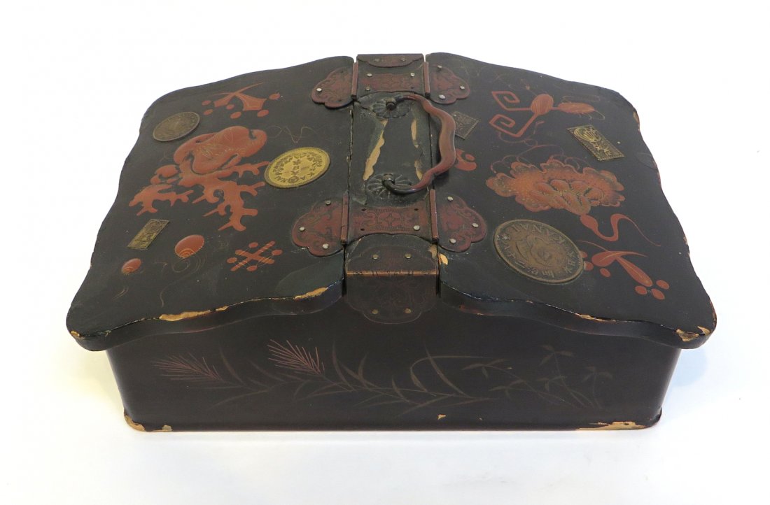 Double Lidded Lacquer Box: With two opposing lids opening upward. In fair condition overall. 7" x5 1/2" x 3" Shipping: We are able to pack and ship this item to an address in the United States for $30.00 via USPS Priority Mail.