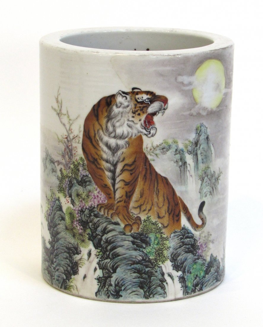 Hand Painted Tiger Brush Pot: A 6" porcelain brush pot with an exceptionally detailed and dramatic roaring tiger lording over the sacred forest, and detailed further with calligraphics . Shipping: We are able to pack and ship this
