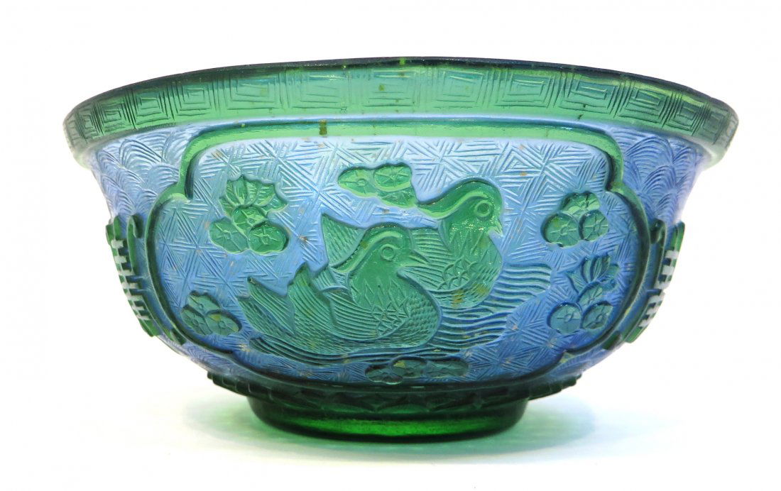 Qianlong Peking Glass Gold Flake Bowl: A 5 1/4" X 2 3/4" bowl in two colors and with carved in designs. Qianlong mark. Shipping: We are able to pack and ship this item to an address in the United States for $40.00 via USPS Priority Mail or