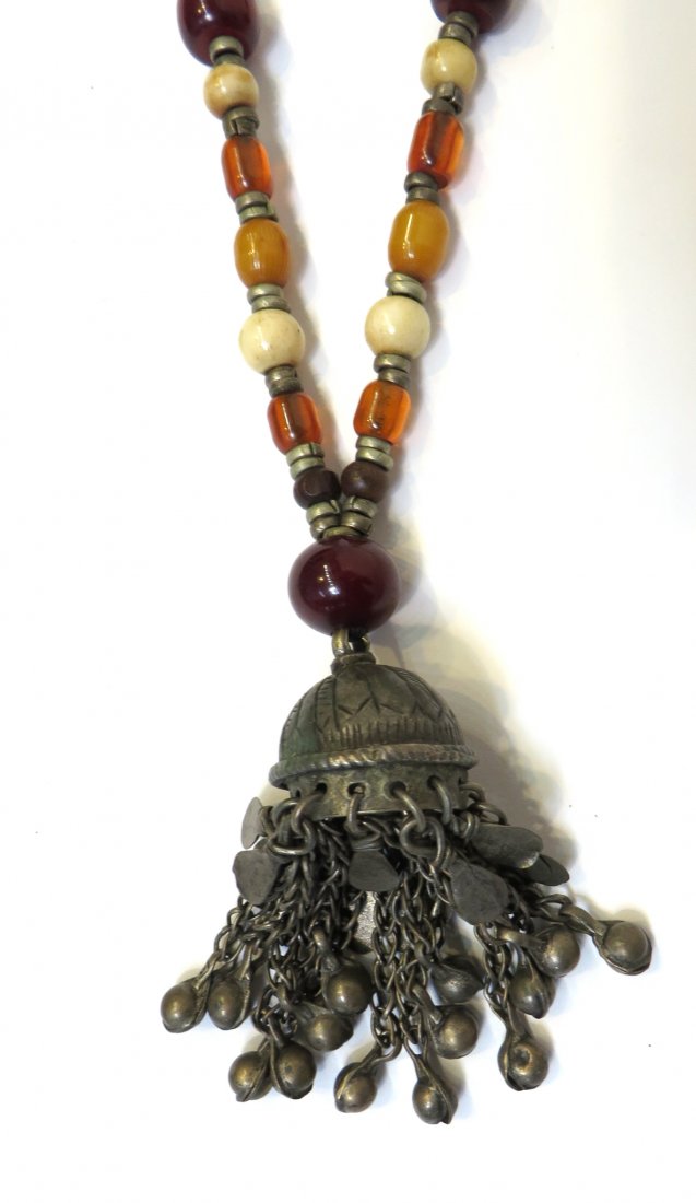 Antique Tibetan Silver, Bone & Amber Necklace: 14" in length. Shipping: We are able to pack and ship this item to an address in the United States for $25.00 via USPS Priority Mail. Tracking information will be sent to your email address. Each addi
