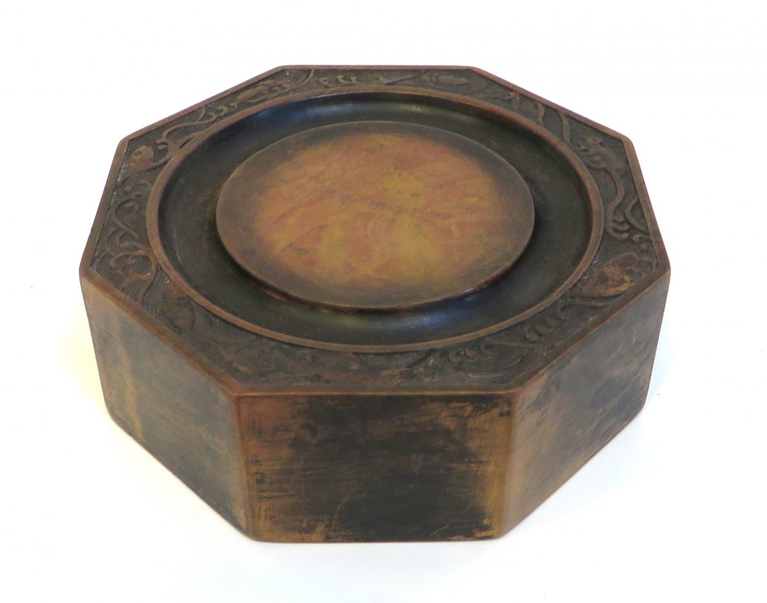 Chinese 19th C. Inkstone: An octantal stone with a central round inkbase surrounded by a concave rim and then an engraved border. 4 1/8" X 1 1/2" Shipping: We are able to pack and ship this item to an address in the United Sta