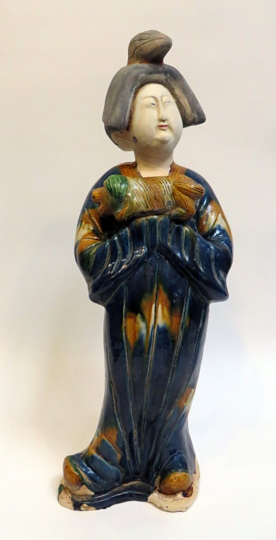 Large Three Color Glaze Figure: A Madame with her pet dog, in three color slip glazes, in the Tang style, 24" in height. Shipping: We are unable to ship this item. Please contact a third party shipper for a quote. Please be sure and